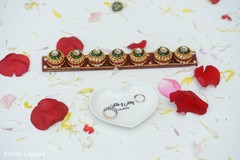 Closeup capture of Indian wedding rings and hazelnuts for ritual. Closeup capture of Indian wedding rings and hazelnuts for ritual.