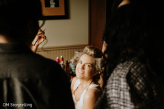 Indian bride getting her hair done Indian bride getting her hair done