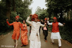 Joyful indian groom showing some dance moves Joyful indian groom showing some dance moves