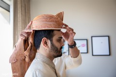 Our indian groom getting ready with his turban. Our indian groom getting ready with his turban.