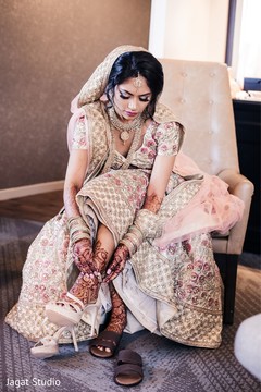 Enchanting Indian bride showing her mehndi art. Enchanting Indian bride showing her mehndi art.