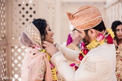 Colorful Indian couple exchanging garlands. Colorful Indian couple exchanging garlands.