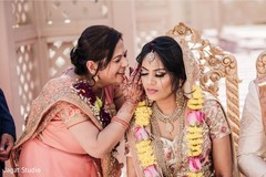 Indian bride paying attention to secrets for a good married life. Indian bride paying attention to secrets for a good married life.
