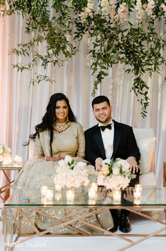 Lovely Indian couple during their wedding reception. Lovely Indian couple during their wedding reception.