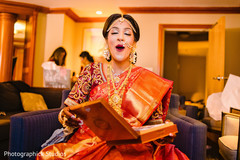 Indian bride receiving a gift. Indian bride receiving a gift.