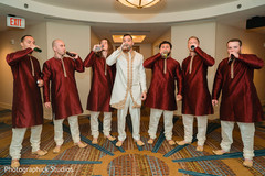 Groom and groomsmen sharing a drink. Groom and groomsmen sharing a drink.