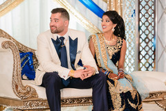 Charming Indian couple at photo shoot. Charming Indian couple at photo shoot.