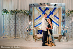 Elegant Indian couple in reception attire. Elegant Indian couple in reception attire.