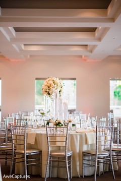 Stunning Indian wedding table flowers decoration. Stunning Indian wedding table flowers decoration.