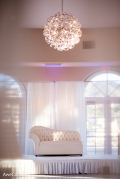 Dreamy Indian wedding reception stage seat decor. Dreamy Indian wedding reception stage seat decor.