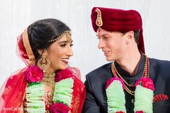 Enchanting indian bride and groom looking face to face. Enchanting indian bride and groom looking face to face.