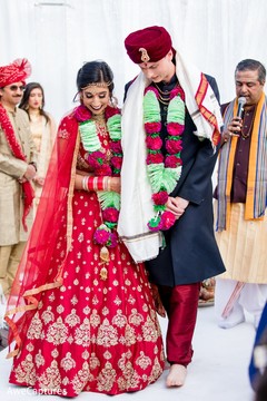 Indian couple walking the seven steps ritual. Indian couple walking the seven steps ritual.