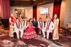 Marvelous Indian couple posing with bridesmaids and groomsmen. Marvelous Indian couple posing with bridesmaids and groomsmen.