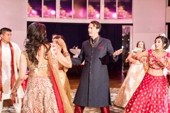 Joyful indian couple showing some dance moves. Joyful indian couple showing some dance moves.