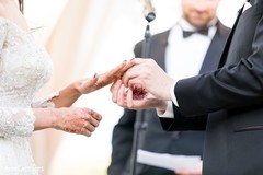 Indian couple's capture puttin wedding rings ritual. Indian couple's capture puttin wedding rings ritual.