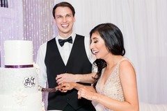 Lovely capture Indian bride and groom cutting cake together. Lovely capture Indian bride and groom cutting cake together.