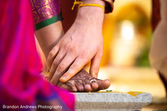 Closeup capture of Indian bride stone stepping. Closeup capture of Indian bride stone stepping.