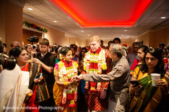 Indian bride saying goodbye to parents. Indian bride saying goodbye to parents.