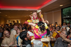 Indian couple exchanging garlands. Indian couple exchanging garlands.