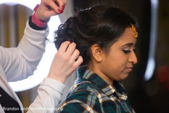 See this lovely bride getting her hair done. See this lovely bride getting her hair done.