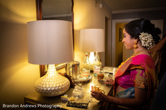 Indian bride about to put her bangles on. Indian bride about to put her bangles on.