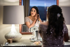 Maharani getting her reception earrings on. Maharani getting her reception earrings on.