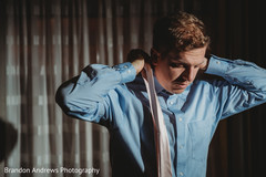 Indian groom getting ready for his reception party. Indian groom getting ready for his reception party.