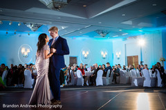 Sweet Indian couple having their first dance. Sweet Indian couple having their first dance.