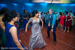 Joyful indian couple showing some dance moves Joyful indian couple showing some dance moves