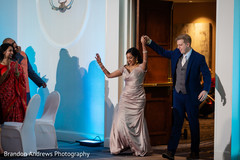 Indian lovebirds grand entrance to wedding reception. Indian lovebirds grand entrance to wedding reception.