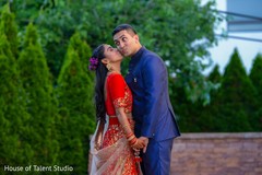 Lovely indian bride kissing groom Lovely indian bride kissing groom