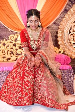 Beautiful indian bride showing henna art Beautiful indian bride showing henna art