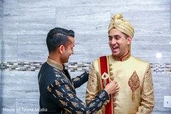 Best man helping groom Best man helping groom