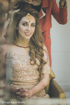 Enchanting Indian bride getting hair done. Enchanting Indian bride getting hair done.