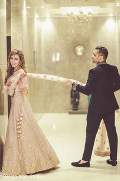 Charming Indian couple at photo shoot. Charming Indian couple at photo shoot.