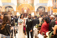 Indian bride and groom leaving the venue. Indian bride and groom leaving the venue.