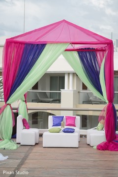 Colorful Indian sangeet mandap decor. Colorful Indian sangeet mandap decor.