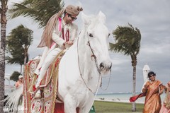 Elegant Indian groom riding baraat white horse. Elegant Indian groom riding baraat white horse.