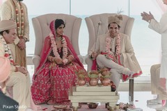 Indian Groom pouring oil to sacred fire. Indian Groom pouring oil to sacred fire.