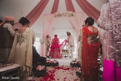 Indian groom walking behind bride ritual. Indian groom walking behind bride ritual.