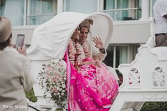 Indian bride and groom leaving on a carriage. Indian bride and groom leaving on a carriage.