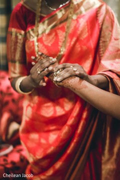 Maharani being assisted with her bracelets. Maharani being assisted with her bracelets.