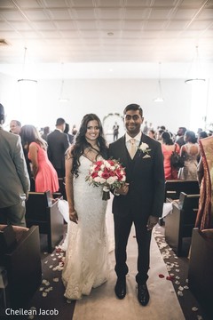 Lovely Indian couple walking down the aisle. Lovely Indian couple walking down the aisle.