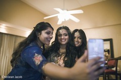 Beautiful maharani and bridesmaids taking a selfie. Beautiful maharani and bridesmaids taking a selfie.