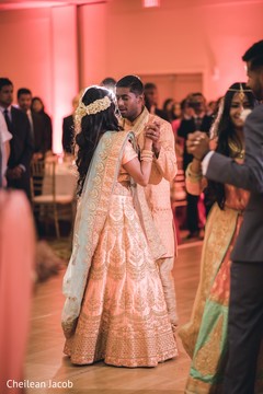 Romantic Indian couple dancing at reception. Romantic Indian couple dancing at reception.