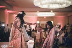 Dazzling Indian bride and bridesmaid about to party. Dazzling Indian bride and bridesmaid about to party.