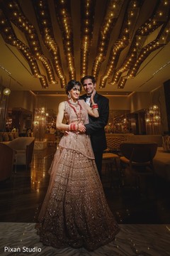Elegant Indian couple posing for photo shoot. Elegant Indian couple posing for photo shoot.