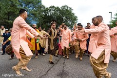 Indian groom and groomsmen dancing. Indian groom and groomsmen dancing.