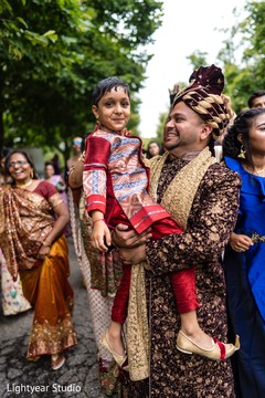 Indian groom with kid guest. Indian groom with kid guest.