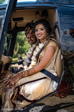 Couple leaving in their helicopter.